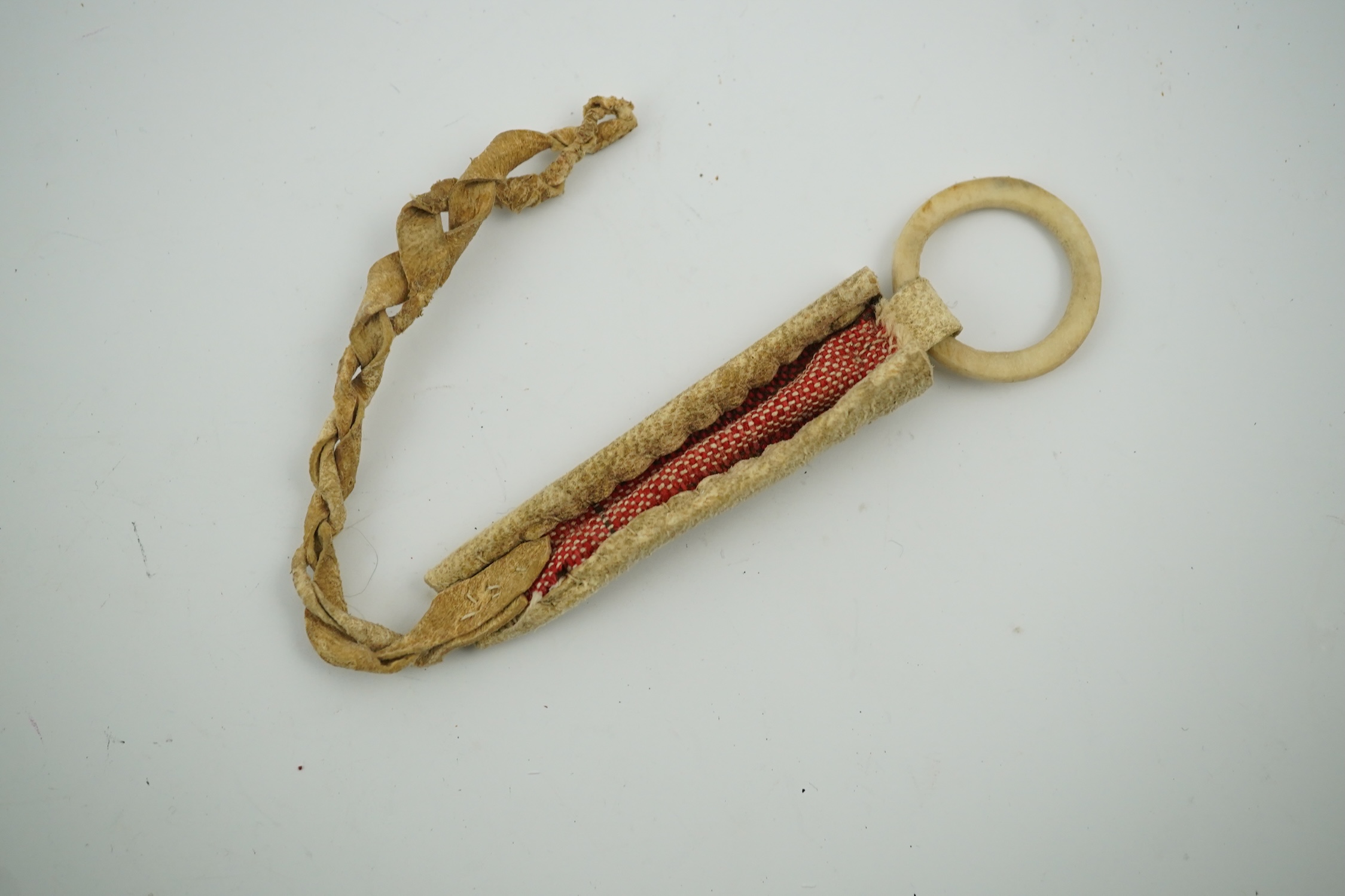 A Sami carved reindeer antler needle case, 10cm high., Condition - good